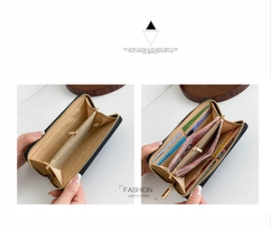 Detailed view of the internal card slots and compartments in the black PU leather wallet