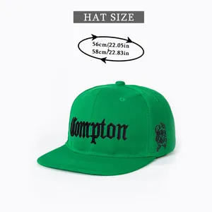 Green flat brim snapback cap with Compton embroidery and 56-58cm hat size guide