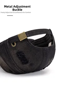 Close-up of brass adjustment buckle on distressed black denim baseball cap detail