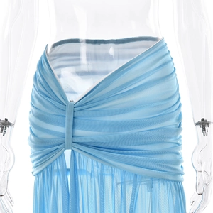 Detailed close-up of light blue mesh skirt featuring elegant ruching and pleated textures