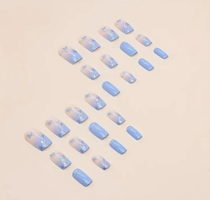 Detail of 24pcs blue butterfly gradient fake nails with silver glitter on square shape
