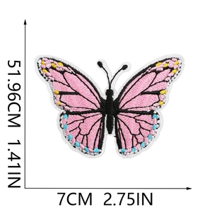 Detailed pink butterfly embroidery patch showing exact dimensions of 7cm width