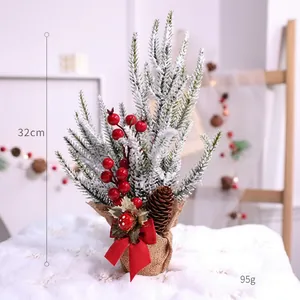 Detailed 32cm mini Christmas tree with frosted snow berries and pine cones for desks