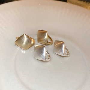 Chic geometric square earrings in gold and silver finish with brushed metal texture