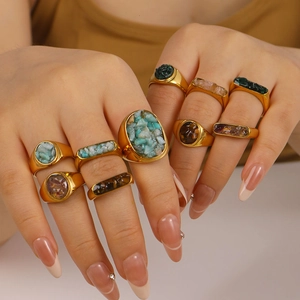 Vintage gold stainless steel rings set featuring natural tiger eye and turquoise stones