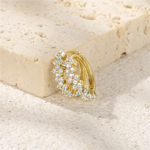 Macro shot of S925 silver gold-plated hoop earrings with inlaid white zircons and hallmark