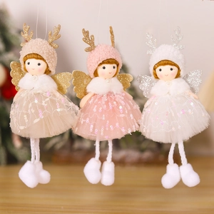 Detailed view of plush angel deer ornaments in beige, pink, and white with sequins