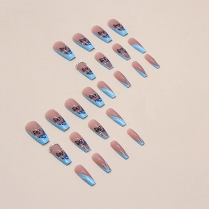French blue butterfly press-on nails in long coffin shape with rhinestone accents
