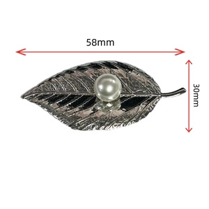 Silver leaf pearl brooch in stainless steel with 58mm x 30mm size dimensions shown
