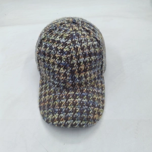 Winter plaid baseball cap featuring colorful blend knit fabric and warm ear protection