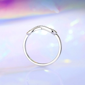 Polished S925 sterling silver infinity ring with sparkling cubic zirconia inlay stones