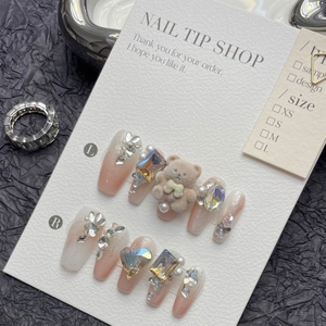 Handmade press-on nails with flocking bear, pink gradient, and luxury rhinestones