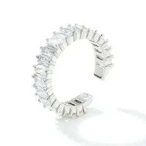 Detail view of adjustable ring showing 2.1cm diameter and baguette-cut zircons
