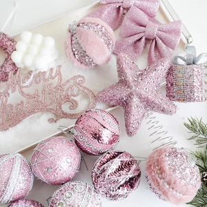 Pink Christmas tree ornaments set with glitter balls, star topper and Merry Christmas sign