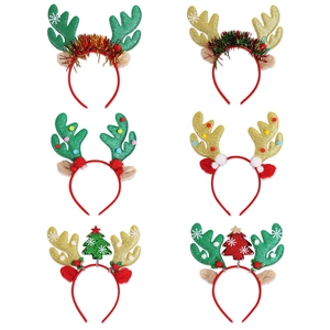 Set of six festive Christmas headbands with glitter antlers and colorful pom-poms
