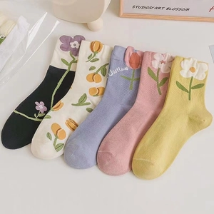 Set of five floral cotton crew socks in multiple colors with sweet embroidered patterns
