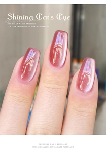 Macro shot of rose pink cat's eye nail polish with silver magnetic shimmer effect