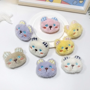 Detail of colorful plush bear doll accessories for DIY bag and clothing decoration