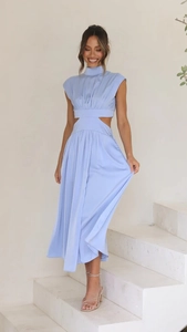Close-up of light blue satin maxi dress with high neck and waist cut-outs for women