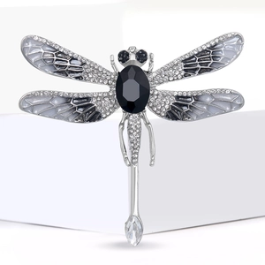 Sparkling dragonfly brooch with silver alloy, rhinestones and black enamel finish
