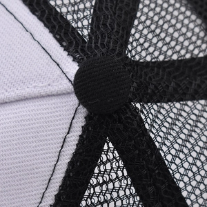 Detailed macro view of high-quality stitching and mesh on the baseball cap crown