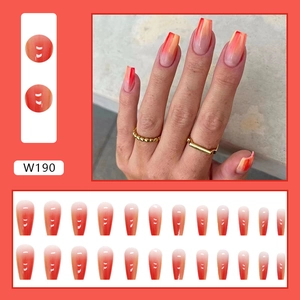 Orange gradient ballet-style press-on nails set with 24 pieces in various sizes.