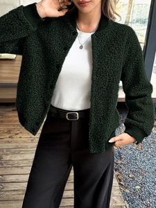 Detailed close-up of dark green textured button cardigan jacket for casual autumn wear