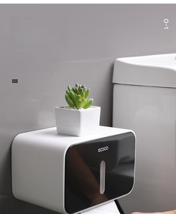 Detail view of wall-mounted paper towel holder with ecoco logo and hidden hanging rod