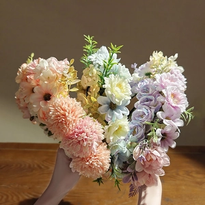Macro shot of colorful heart-shaped faux flower arrangement for ethnic hair accessories