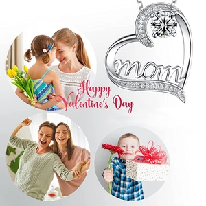 Detailed view of silver heart mom necklace with large white zircon and small crystals
