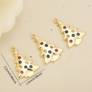 Golden Christmas tree pendant with colorful stones and dimensions 2.2cm by 1.5cm