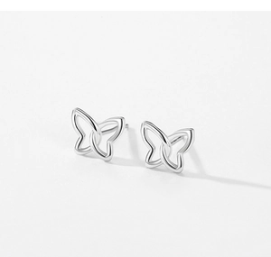 Detailed macro view of S925 silver hollow butterfly stud earrings with polished finish