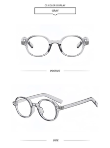 Detail view of oval gray sunglasses showing front and side profile on white background