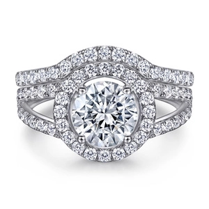 Macro detail of 925 silver moissanite ring set with double band and round halo design