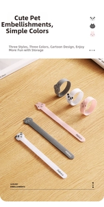 Detail of cute animal-shaped cable ties with cat, panda, and rabbit velcro straps