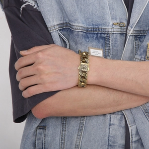 Retro golden engraved titanium steel bracelet for men with vintage patterns