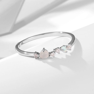 S925 sterling silver ring featuring a round moonstone opal and sparkling zircons
