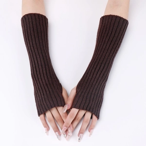Detail of dark brown knitted arm warmers with a classic vertical ribbed texture design