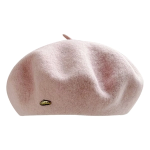 Pink wool beret for women featuring a minimalist solid color and gold decorative button