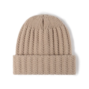 Thick ribbed knit beanie in light brown featuring a classic wide fold-over cuff design