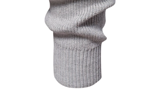 Close-up of light grey knitted cuffs showing detailed texture and ribbed finishing