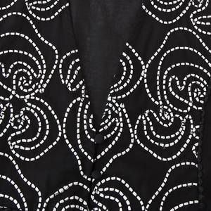 Women's V-neck sleeveless black shirt with ethnic white embroidery and fabric buttons