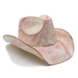 Close-up of pink textured cowboy hat with faux snakeskin print and curved wide brim