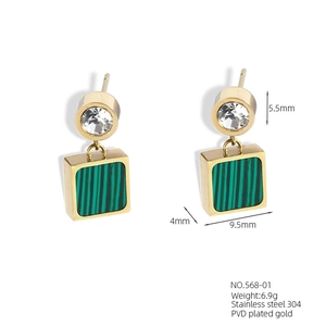 Detail view of 18K gold plated earrings with green malachite squares and size specs