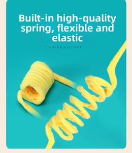 Close-up of bright yellow plush spring cat toy with flexible built-in steel wire