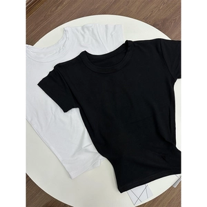 Short sleeve modal cotton slim fit T-shirts in black and white colors on a wooden background
