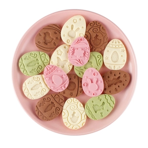 9pcs Easter cookie cutter set with embossed egg shapes featuring bunny and floral patterns