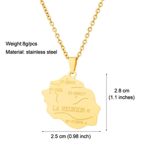 Macro shot of Reunion Island map pendant with city names in gold stainless steel