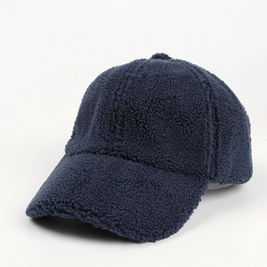 Detailed texture of navy blue fleece fabric on a warm winter baseball cap design