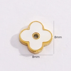 Detailed close-up of 8mm white shell clover pendant with 14K gold titanium steel edges